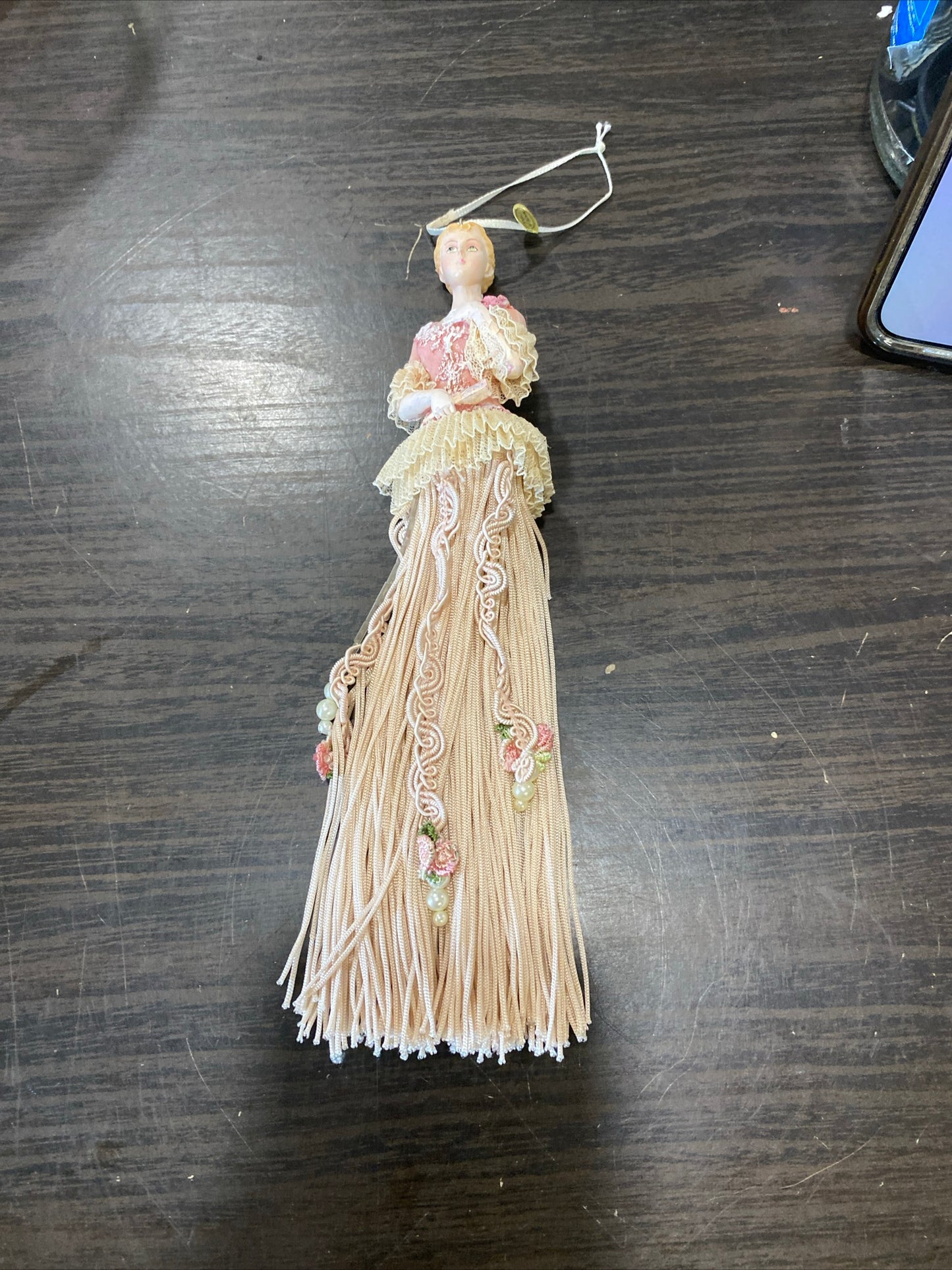 (1863) tassel lady ornament.