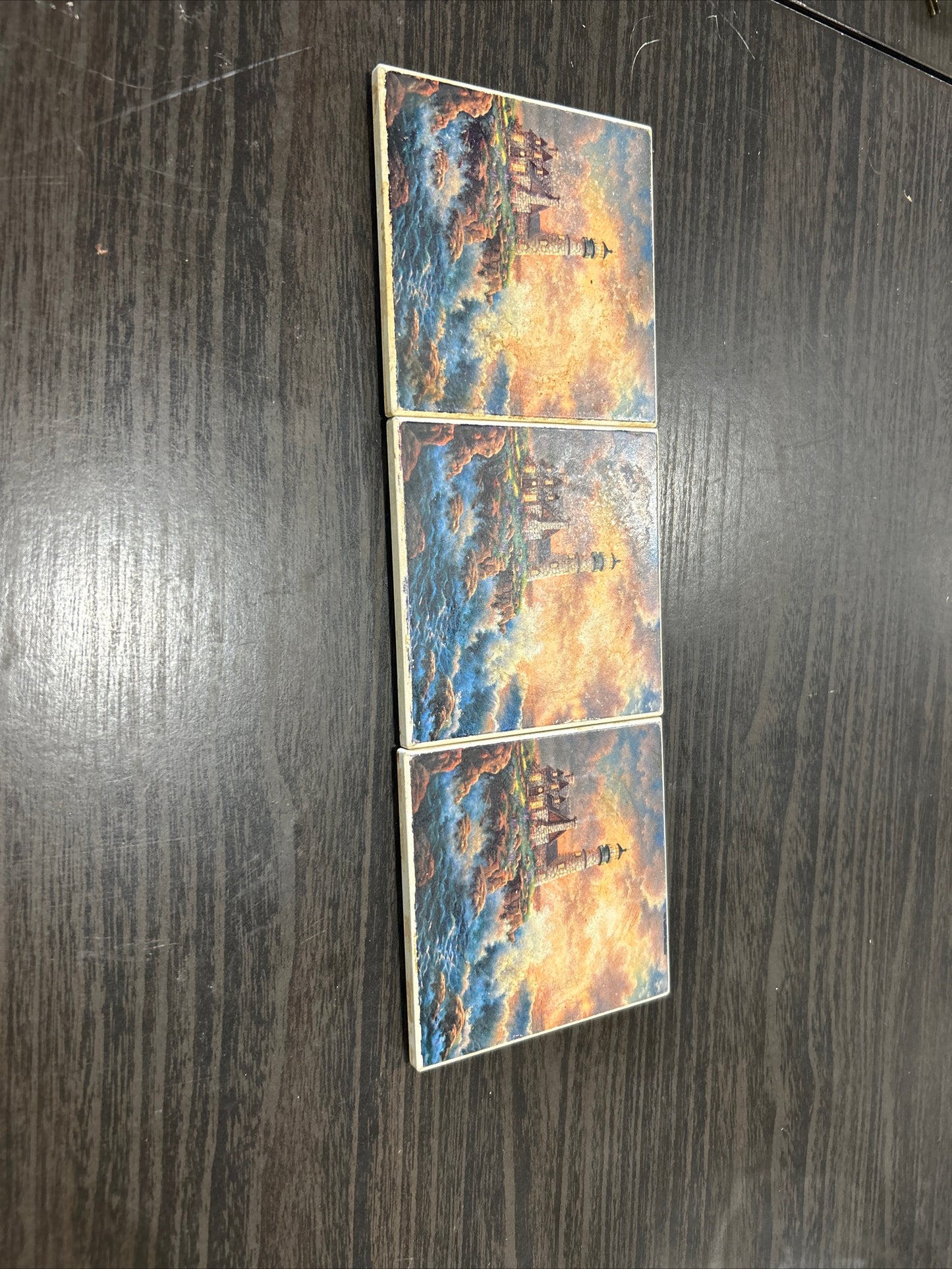 (430) Set of three lighthouse coasters